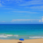 Use a patio umbrella at the beach